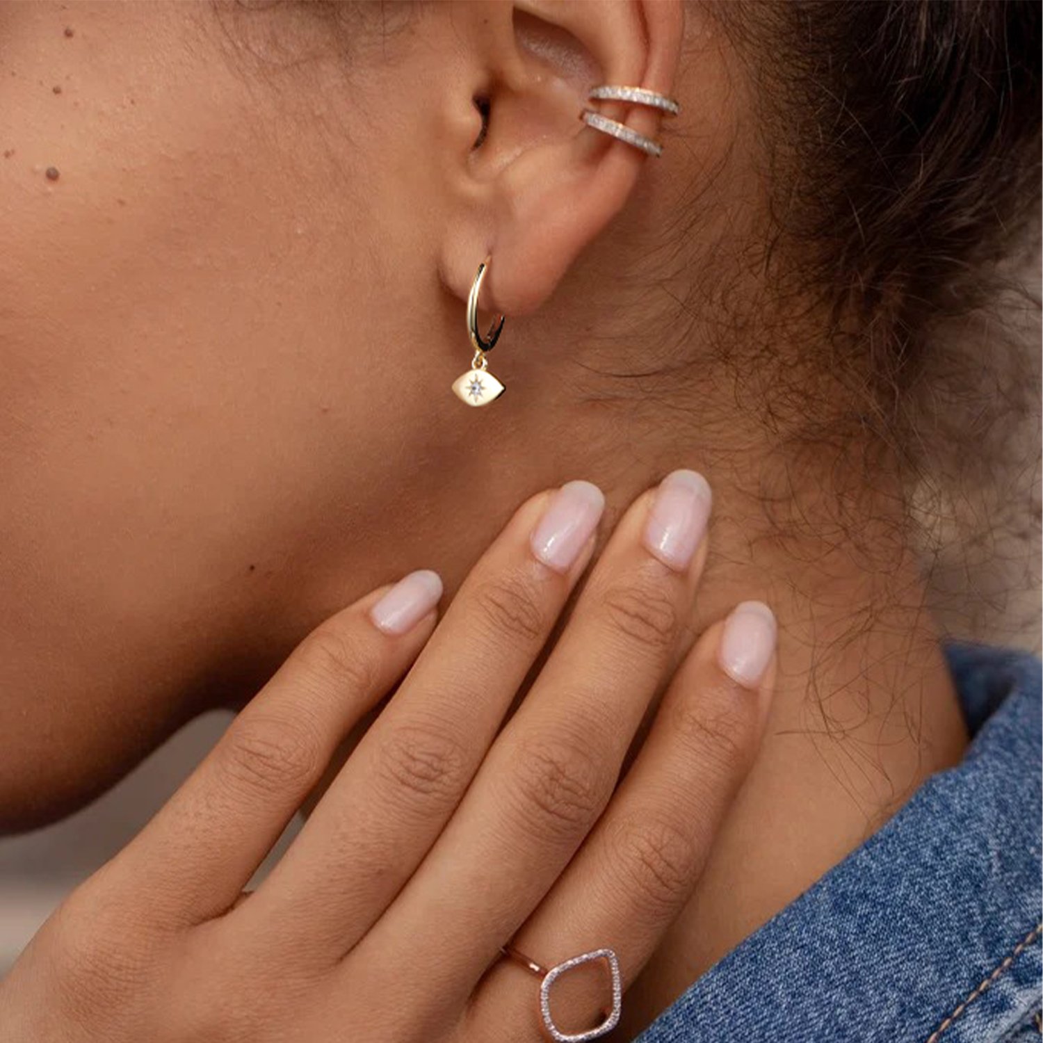 Mini Huggie Evil Eye Hoops - Image 2
